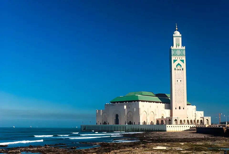 The Hassan II Mosque and its minaret on the seafront in Casablanca